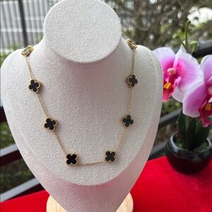 Elegant Gold and Black Clover Necklace
